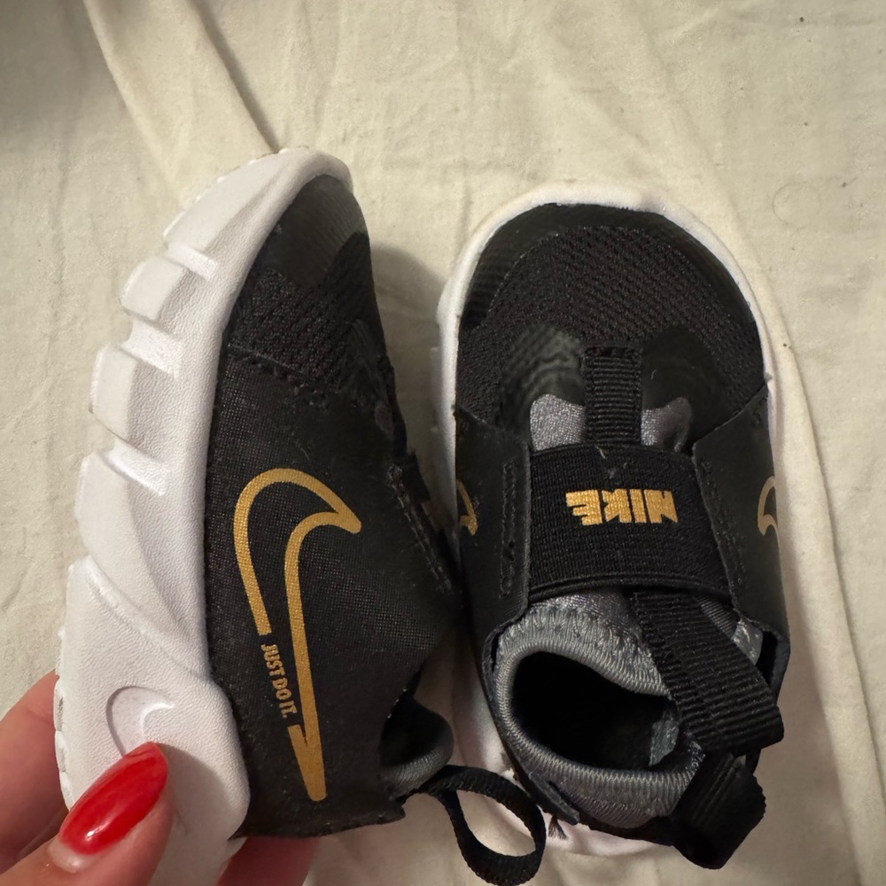 Nike Kids Black and Gold Shoes